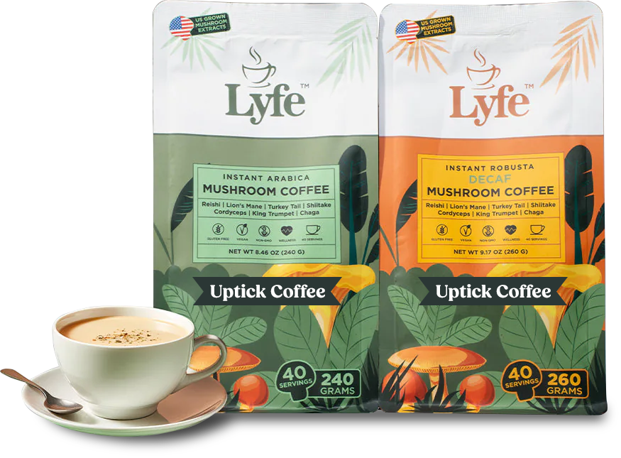 2 bags of Uptick Coffee with a cappuccino in front